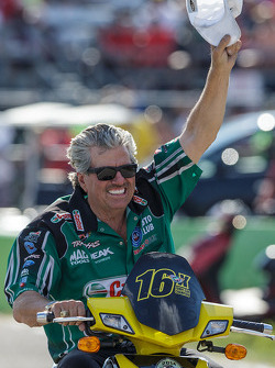 John Force celebrates his daughter Courtney's victory in Top Fuel Funny Car