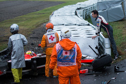 Adrian Sutil, Sauber F1 Team looks on as the safety team at work after the crash of Jules Bianchi, Marussia F1 Team