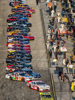 Brad Keselowski leads the field to pace laps