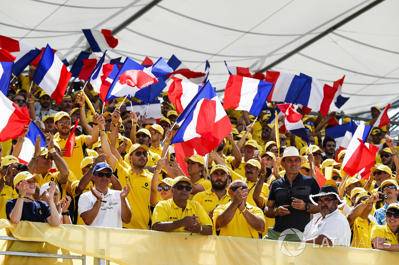 French fans wave their tricolour flags