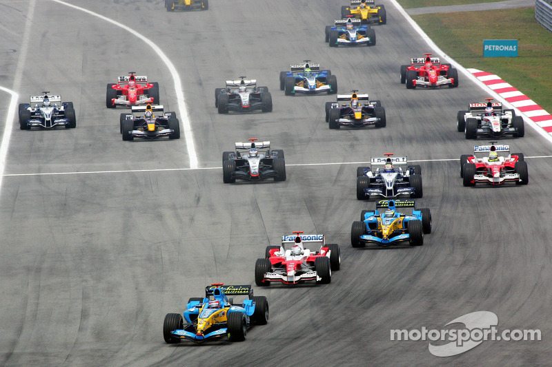 Fernando Alonso leads Jarno Trulli