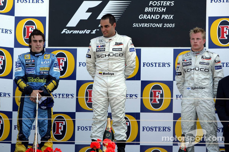 Podium: race winner Juan Pablo Montoya with Fernando Alonso and Kimi Raikkonen