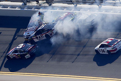 J.J. Yeley, BK Racing Toyota, Reed Sorenson, Team Xtreme Racing Chevrolet, Clint Bowyer, Michael Waltrip Racing Toyota in a crash during qualifying