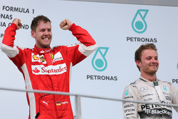 Sebastian Vettel, Scuderia Ferrari y Nico Rosberg, Mercedes AMG F1 Team