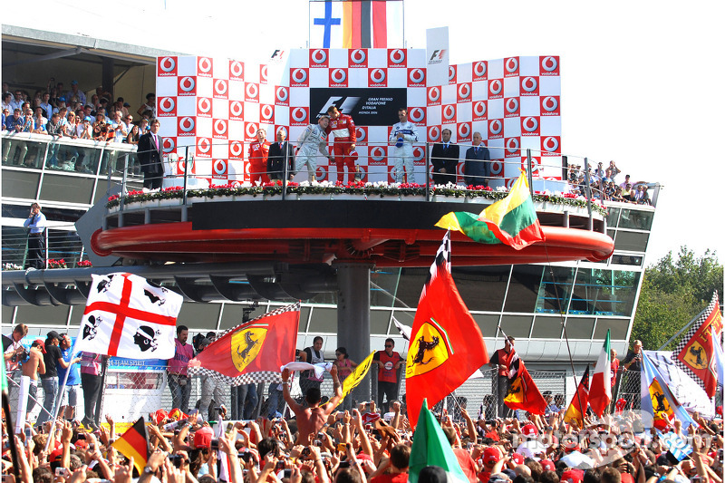 Podium: race winner Michael Schumacher with Kimi Raikkonen and Robert Kubica