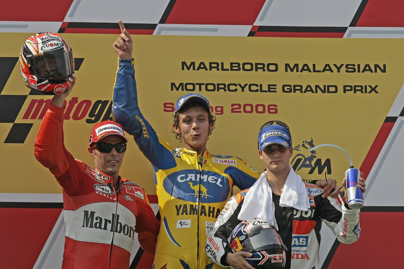 Podium: 1. Valentino Rossi, 2. Loris Capirossi, 3. Dani Pedrosa