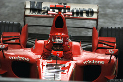 Race winner Michael Schumacher celebrates