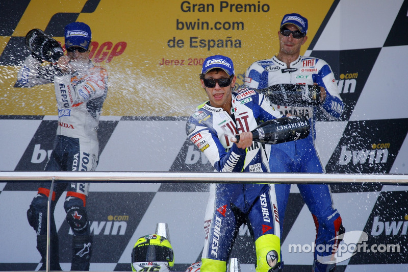 Podium: champagne for Valentino Rossi, Dani Pedrosa and Colin Edwards