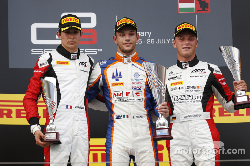 Luca Ghiotto, Trident merayakan his win di podium bersama peringkat kedua Esteban Ocon, ART Grand Pr