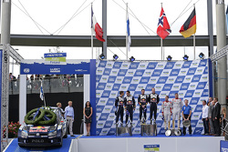 Podium: winners Jari-Matti Latvala and Miikka Anttila, Volkswagen Motorsport, second place Sébastien
