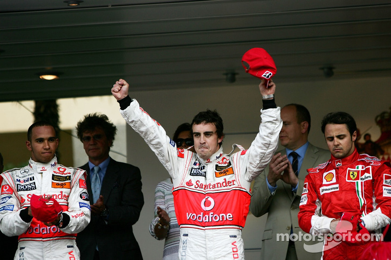 Podium: race winner Fernando Alonso with Lewis Hamilton and Felipe Massa