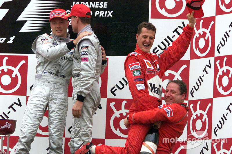 Podium: race winner and 2000 World Champion Michael Schumacher, Ferrari, second place Mika Hakkinen, McLaren, third place David Coulthard, McLaren, Jean Todt