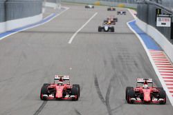 Kimi Raikkonen, Ferrari SF15-T and Sebastian Vettel, Ferrari SF15-T battle for position