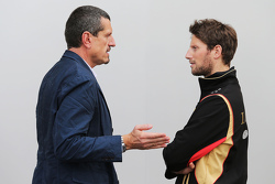 (L to R): Guenther Steiner, Haas F1 Team Principal with Romain Grosjean, Lotus F1 Team