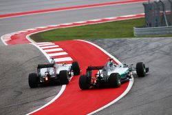 Nico Rosberg, Mercedes and Lewis Hamilton, Mercedes make contact in turn one