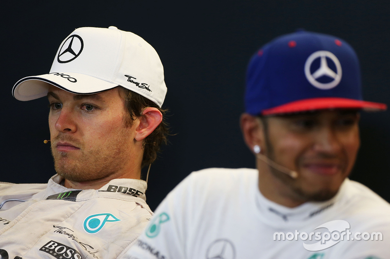 Second place Nico Rosberg, Mercedes AMG F1 and race winner and World Champion Lewis Hamilton, Merced