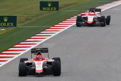 Alexander Rossi, Manor Marussia F1 Team and team mate Will Stevens, Manor Marussia F1 Team with punctures