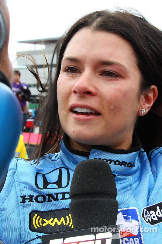 Race winner Danica Patrick gives interviews