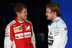 Terzo posto Sebastian Vettel, Ferrari SF15-T e il polesitte Nico Rosberg, Mercedes AMG F1 W06