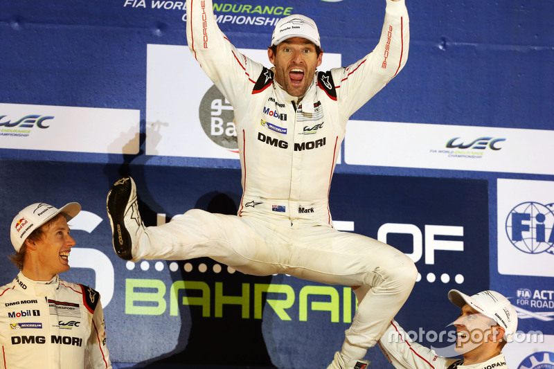 2015 champion Mark Webber celebrates on the podium