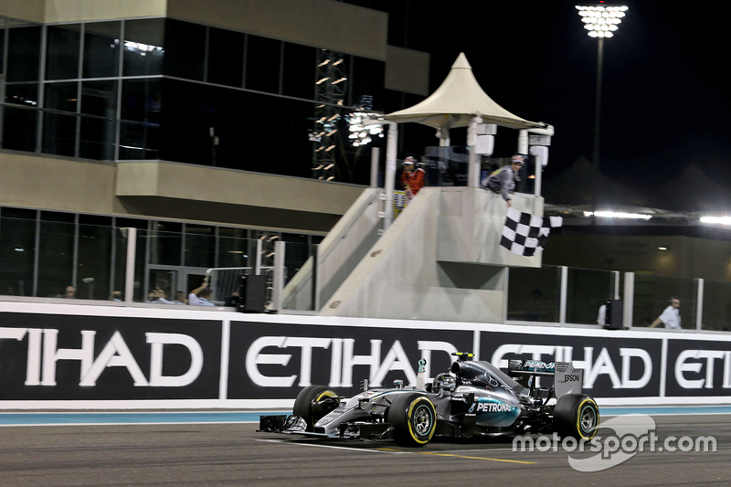 Race winner Nico Rosberg, Mercedes AMG F1 W06 celebrates as he takes the chequered flag at the end o