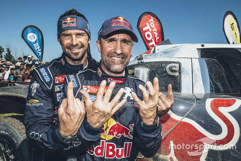 Car category winner Stéphane Peterhansel with teammate Cyril Despres, Peugeot Sport