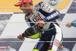 Podium: champagne for Valentino Rossi