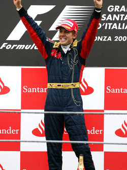 Podium: race winner Sebastian Vettel celebrates