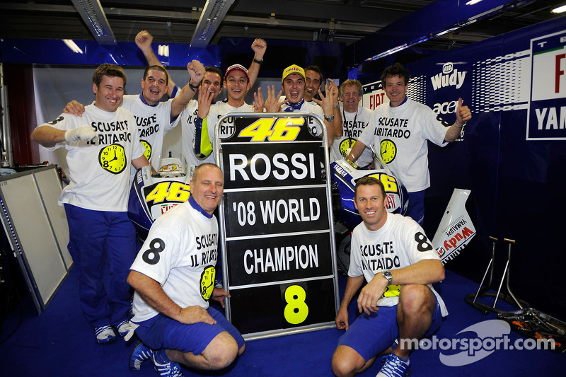 Race winner and 2008 World Champion Valentino Rossi celebrates with Yamaha team members