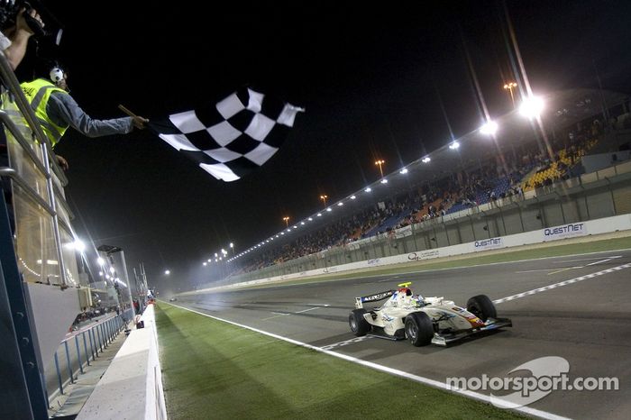 Sergio Perez takes the checkered flag to win the race