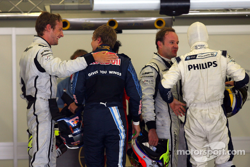 Jenson Button, Brawn GP with Sebastian Vettel, Red Bull Racing who gets pole position